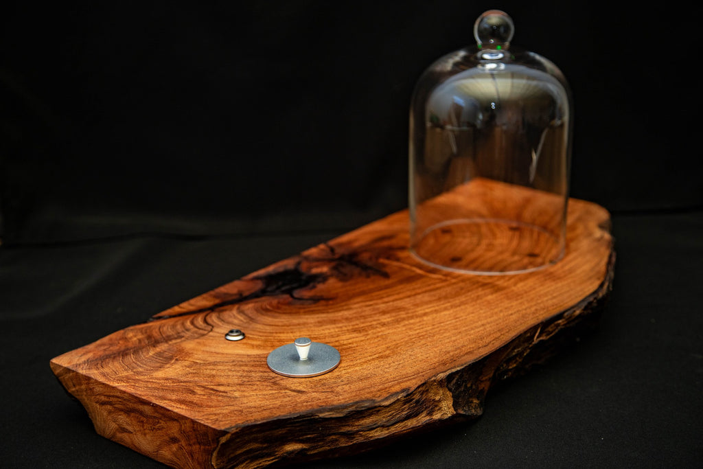 Live-edge mesquite base with glass dome and chip cup, detail