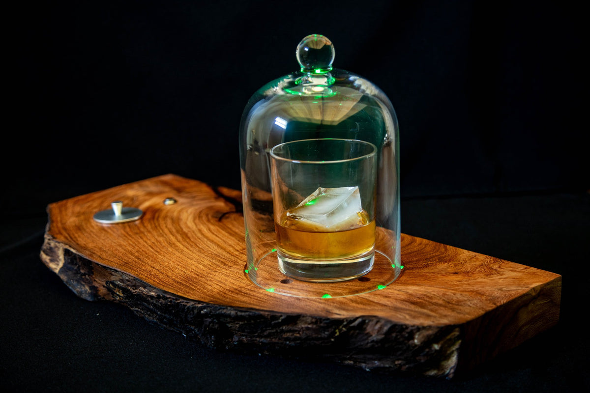 Whiskey old fashioned smoking under the glass dome