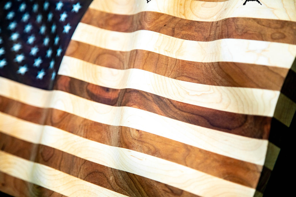 Epoxy star field and striped hardwood, close detail