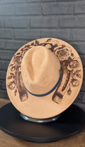 Lucky Rose - light suede hat with roses wrapped around a horseshoe engraving, blue accent band